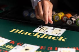 start77 Android app home screen showing football odds, live casino games, and account menu